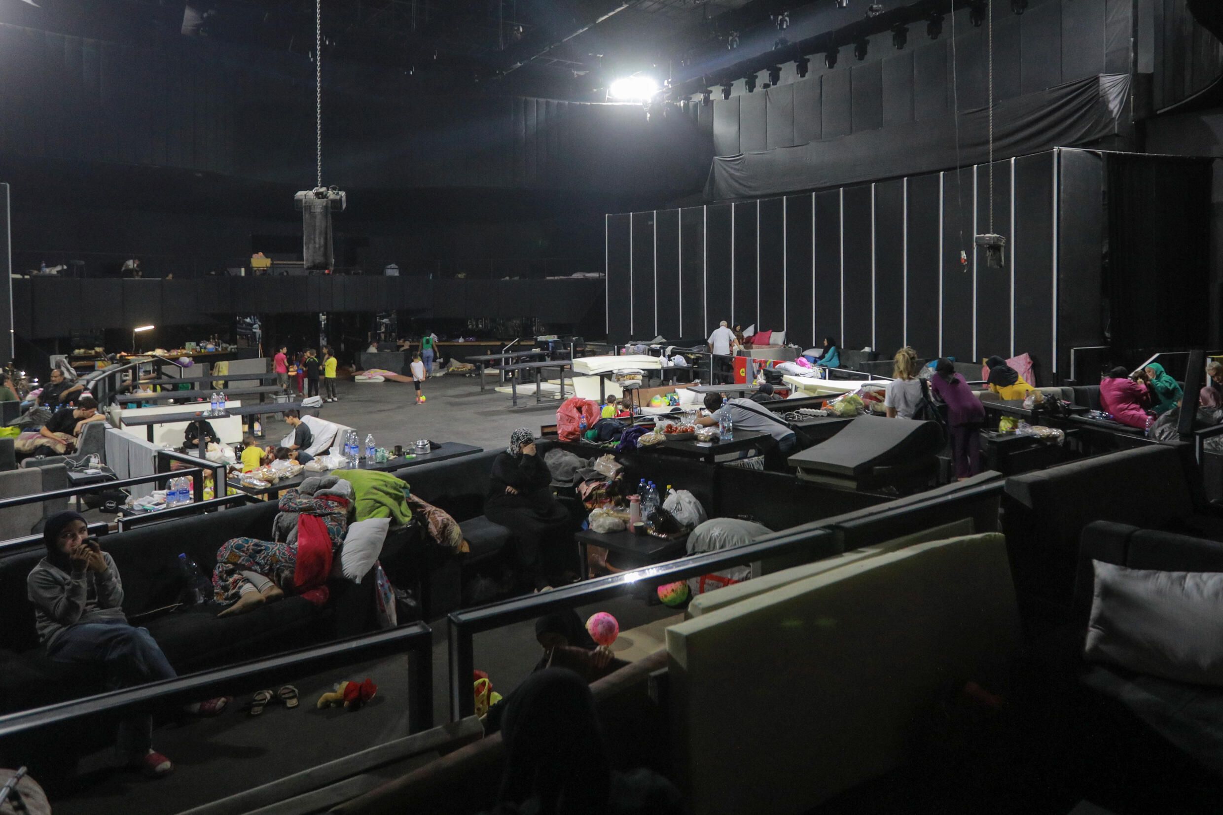 Party over: displaced families shelter in Beirut nightclub