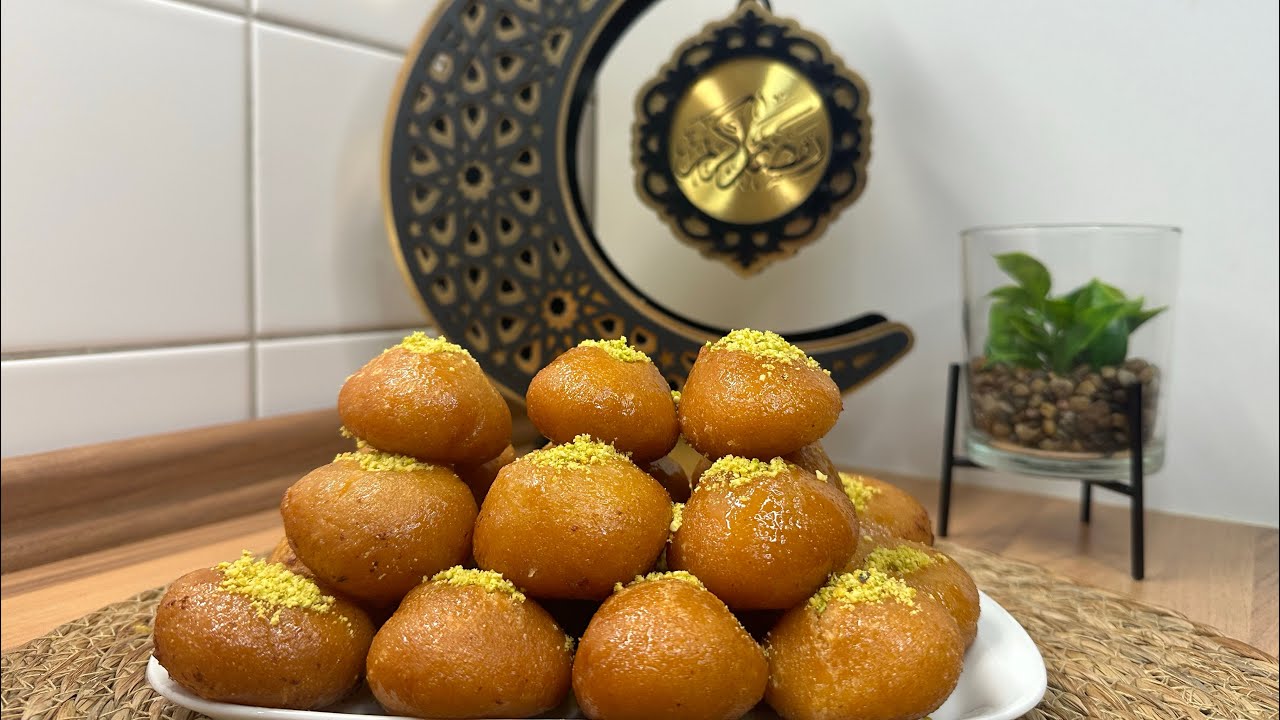 حلي بوقك بحلوى مميزة... كرات البسبوسة بجوز الهند مع كوب شاي انسي أي حلويات تانية 5 حلي بوقك بحلوى مميزة… كرات البسبوسة بجوز الهند مع كوب شاي انسي أي حلويات تانية